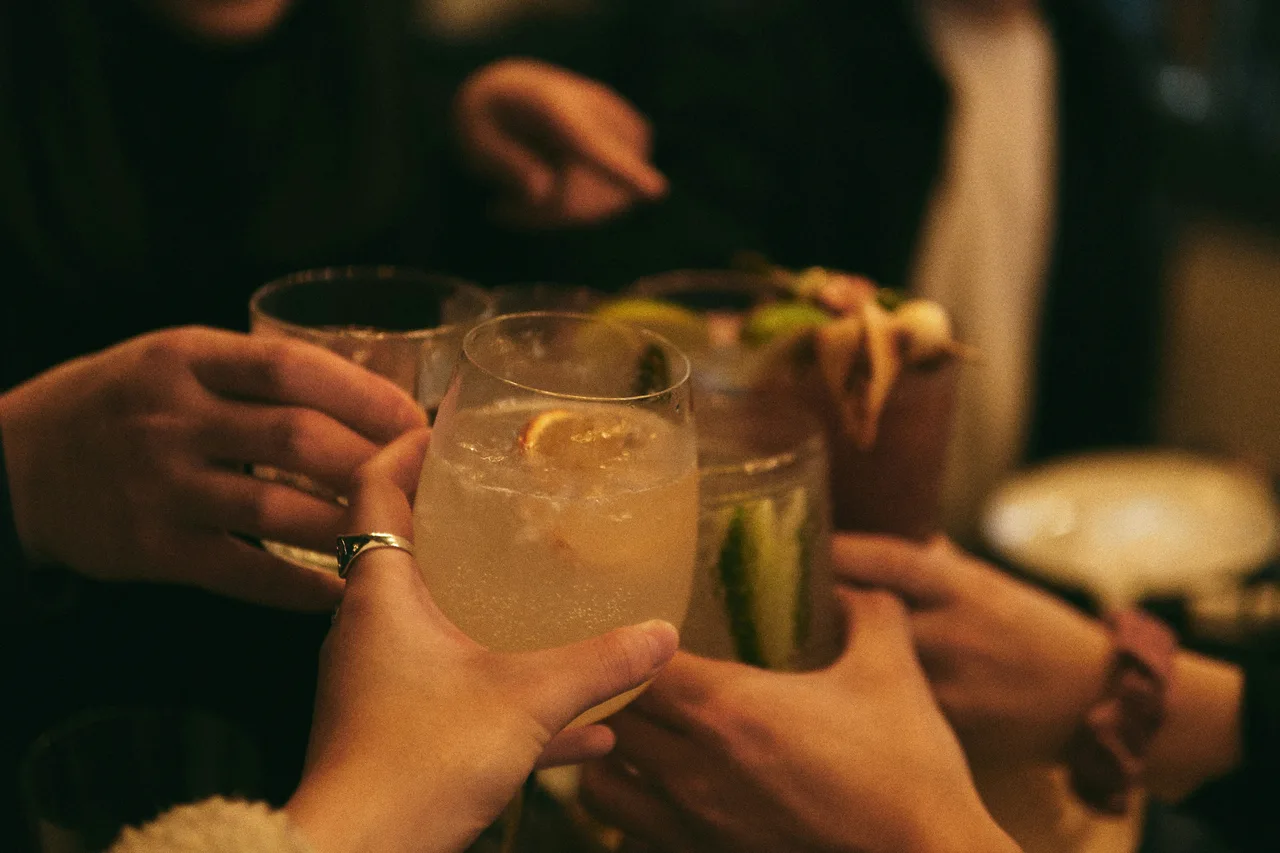 Guests toasting at a corporate holiday party in San Francisco