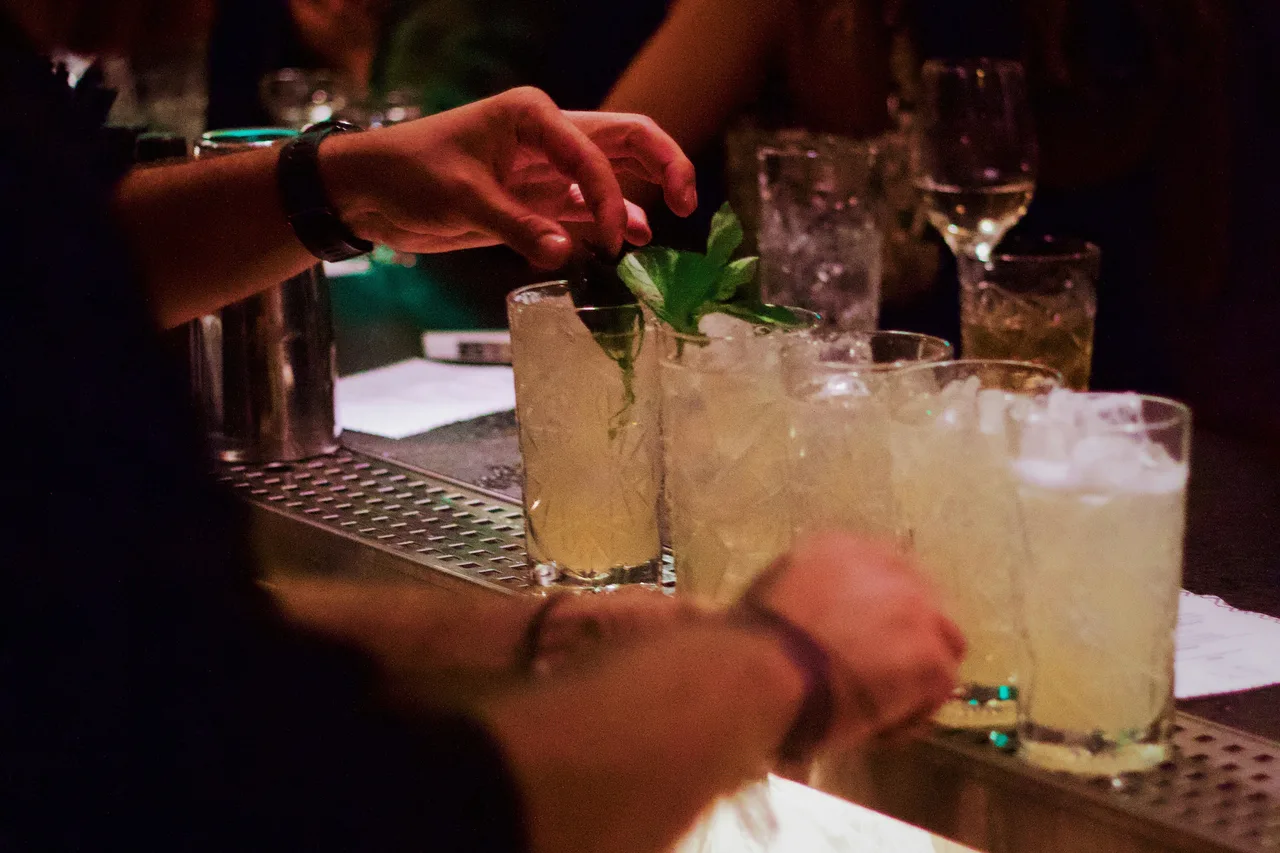Open bar with cocktails and bartender at a San Francisco event