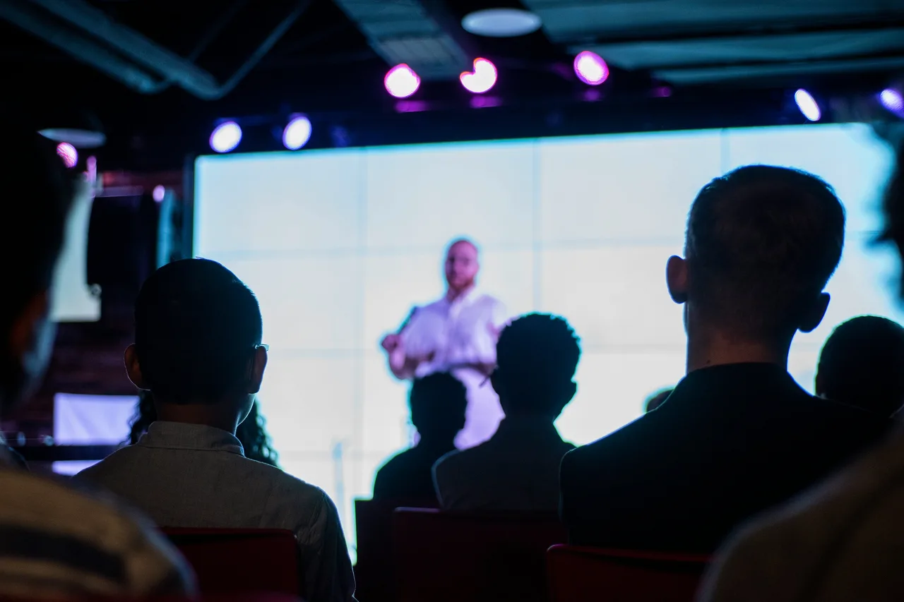Speaker presenting at a corporate event keynote in San Francisco
